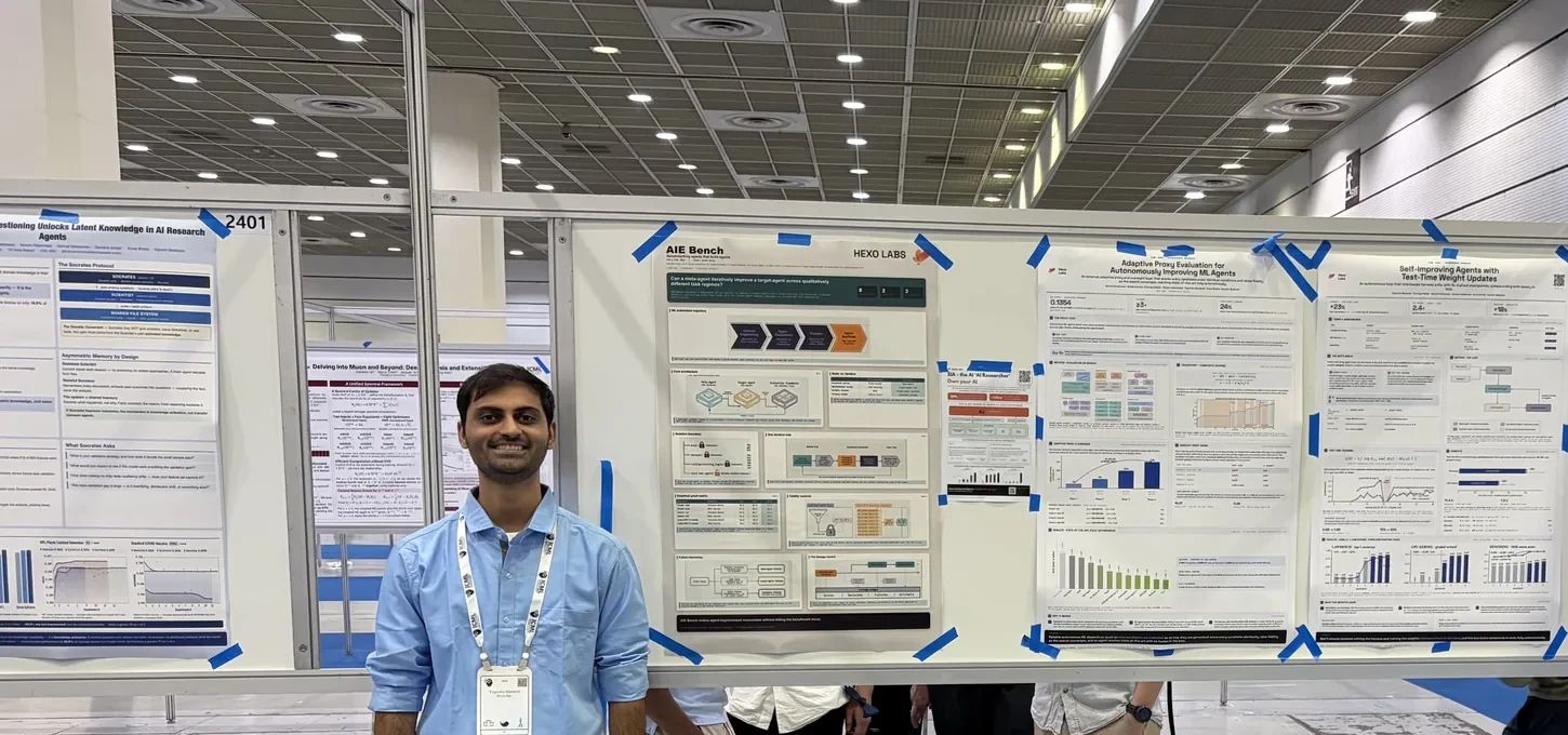 Yogendra Manawat standing beside research posters at ICML 2026